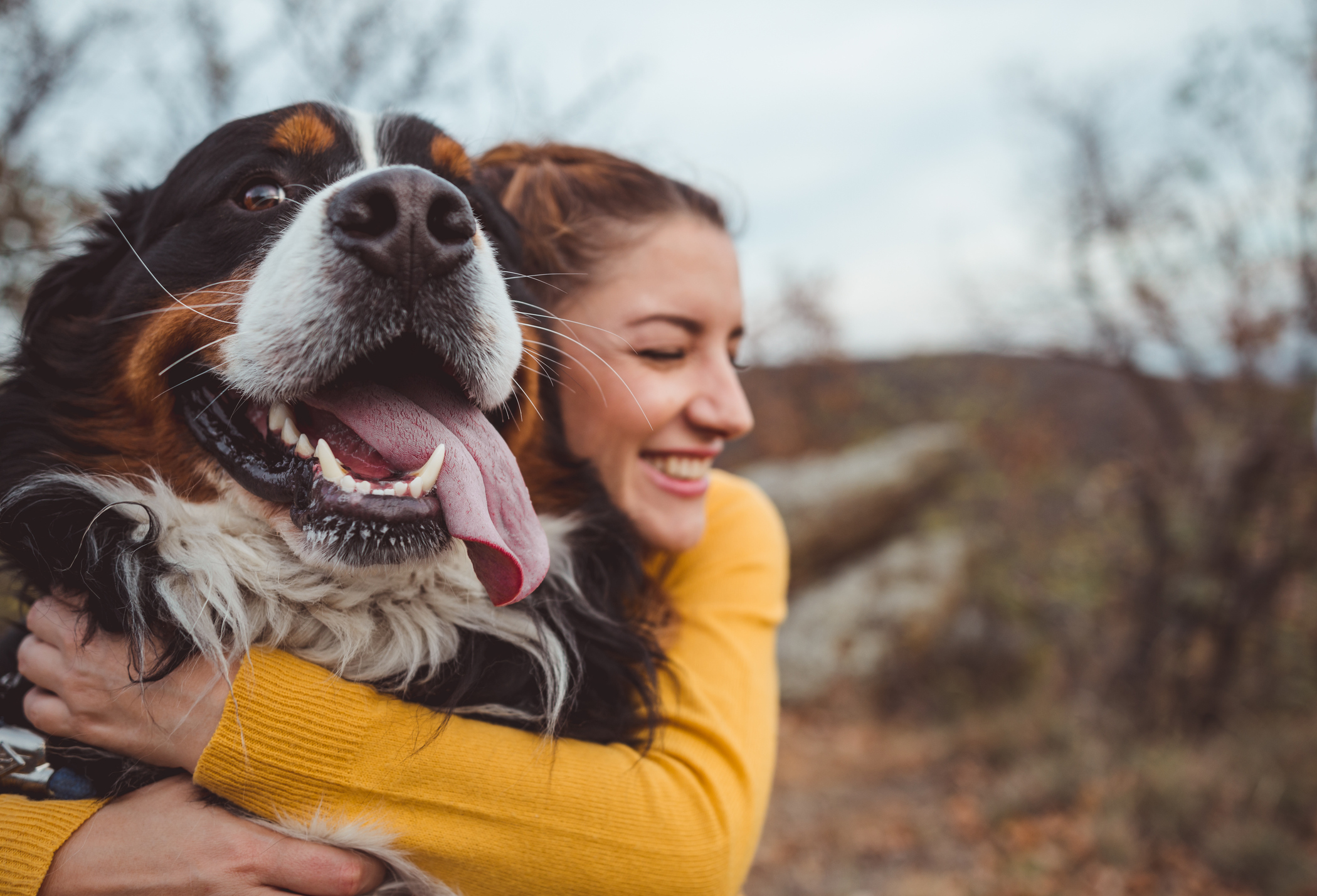 Young woman with dog at pet-friendly apartments in uptown kansas city missouri